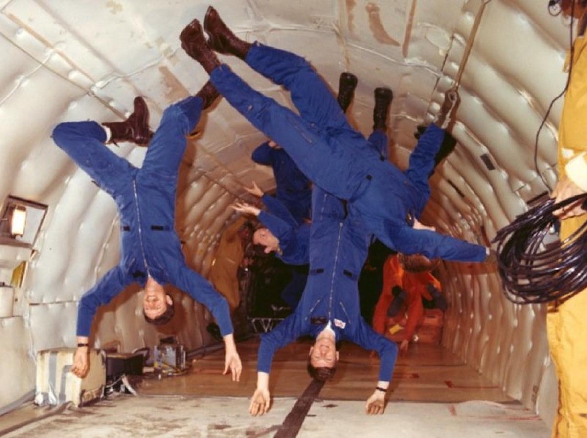 Astronauts floating in a space shuttle