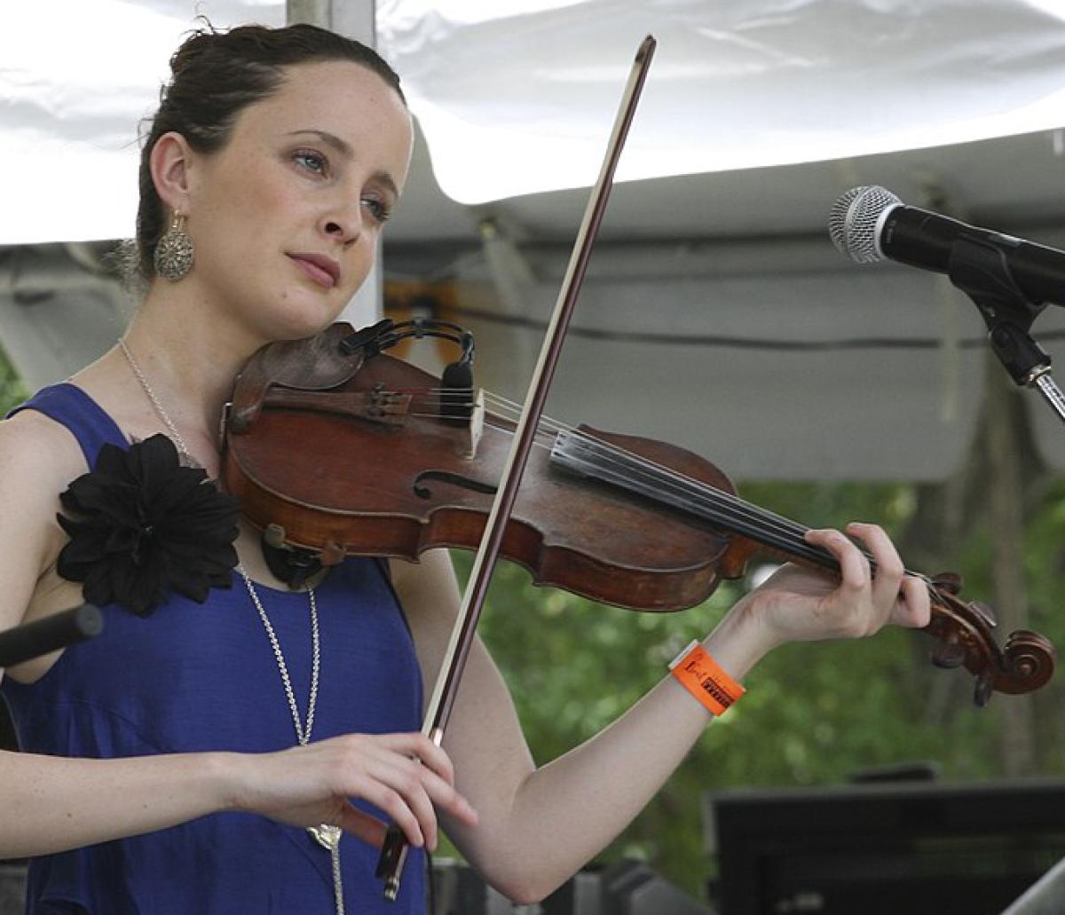 Someone playing the violin
